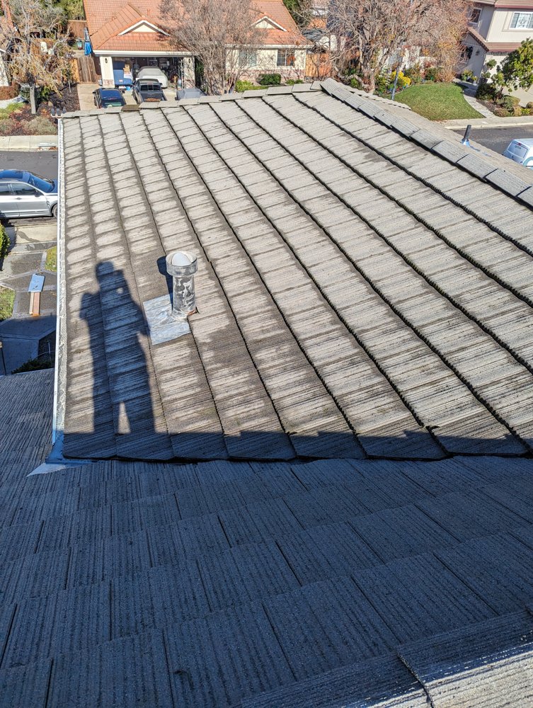 Slide of Total Package Roofing