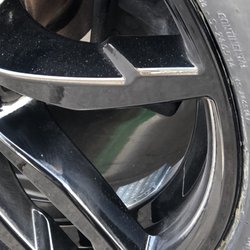 Wellis Alloy Wheel Repair - Again, silver wheel weights on gloss black rims.