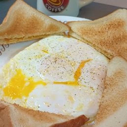 a fried egg on toast on a plate