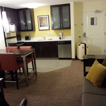 Residence Inn Bloomington - Sitting and kitchen area of their suite. - Hotels Near Me - Bloomington, Illinois