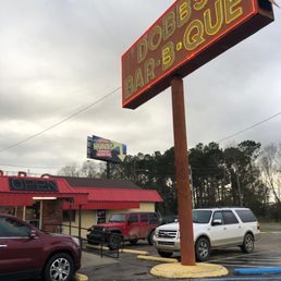 Delapitated business sign.
