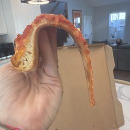 Floppy cold pizza.