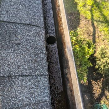 Simply Clean - Our bedroom down shoot drains, now. After they cleaned - Solar Panel Cleaning Near Me