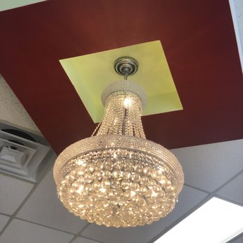 Nail Fx - Beautiful chandelier at the entrance of the salon. There was another one back near the spa pedi chairs. - Nail Salons Near Me - Little River, South Carolina