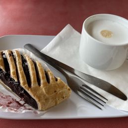 Cherry strudel and a cappuccino Cherry strudel and a cappuccino