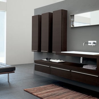 Pacific Contracting - a modern bathroom with dark wood cabinets - General Contractors Near Me Pacific Contracting - a modern bathroom with dark wood cabinets - General Contractors Near Me