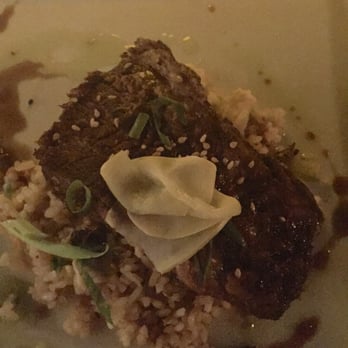 Oasis on the Beach - Soy braised boneless short rib, truffle-shoyu fried rice, bacon (full serving) - Hawaiian Near Me - Kapaa, Hawaii Oasis on the Beach - Soy braised boneless short rib, truffle-shoyu fried rice, bacon (full serving) - Hawaiian Near Me - Kapaa, Hawaii