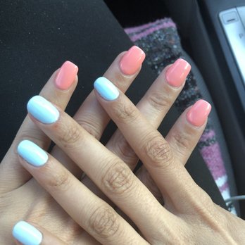 Red Nails - Me and my sister's amazing nails! Done by Don and Phat. - Nail Salons Near Me - Olathe, Kansas