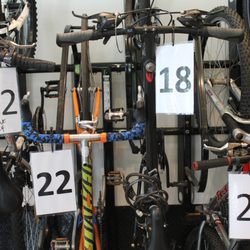 Phoenix Bikes - Rack of customer bikes in for service