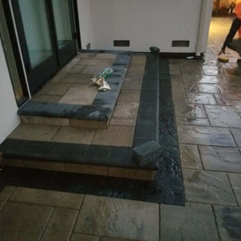 Coronel Landscaping - a man working on a patio - Landscaping Near Me Coronel Landscaping - a man working on a patio - Landscaping Near Me