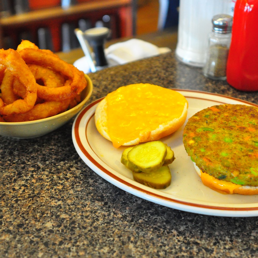 Holsten's - Veggie burger with cheddar cheese and onion rings. - Candy Stores Near Me - Bloomfield, New Jersey Holsten's - Veggie burger with cheddar cheese and onion rings. - Candy Stores Near Me - Bloomfield, New Jersey