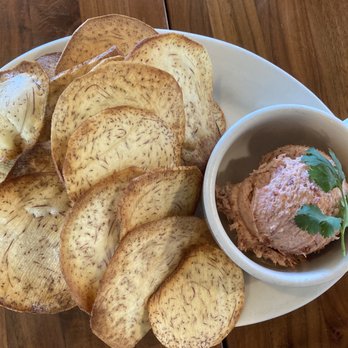 Pounders Restaurant - House made taro chips w/smoked marlin dip!!! Oh ka ONO! We were happy with just the chips! - Pizza Near Me - Laie, Hawaii Pounders Restaurant - House made taro chips w/smoked marlin dip!!! Oh ka ONO! We were happy with just the chips! - Pizza Near Me - Laie, Hawaii