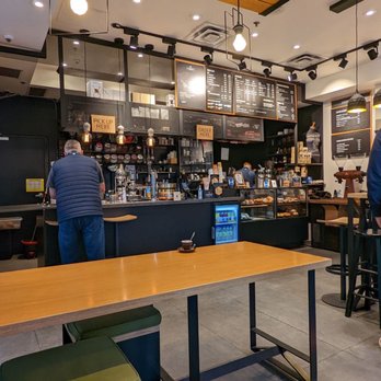 Coffee Island - Dining area and cashier area - Coffee Roasteries Near Me - Toronto, Ontario