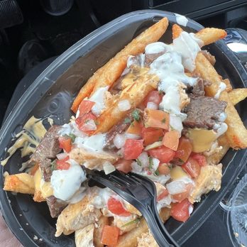 Taco Bell - Garlic steak Steak Garlic Nacho Fries - Fast Food Near Me - Clinton, Maryland
