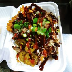 Porky's Food Truck - Can't remember what they called them, but it's pretty much Waffle Fry Poutine