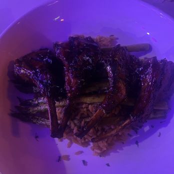The Domain Restaurant & Lounge - Lamb Chops with asparagus and dirty rice. - Breakfast & Brunch Near Me - Houston, Texas The Domain Restaurant & Lounge - Lamb Chops with asparagus and dirty rice. - Breakfast & Brunch Near Me - Houston, Texas