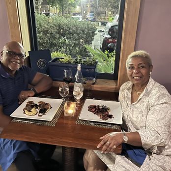 Blue 11 - My husband and I with our main course's, and cocktails. - Seafood Near Me - Saint Thomas, Virgin Islands