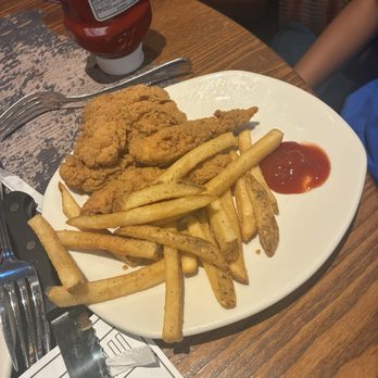 Outback Steakhouse - Kids meal. Chicken Tenders and Kids Aussie Fries - Steakhouses Near Me - Kissimmee, Florida Outback Steakhouse - Kids meal. Chicken Tenders and Kids Aussie Fries - Steakhouses Near Me - Kissimmee, Florida