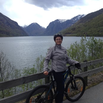Flåm Camping og Vandrarheim - Rental bikes from the hostel. Biking along the fjord on an overcast day. - Campgrounds Near Me - Flåm, 14