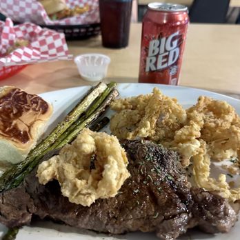 The District - Grub & Social - Ribeye with roll, asparagus and onion rings - so flavorful! All cooked to perfection. - Comfort Food Near Me - Alice, Texas The District - Grub & Social - Ribeye with roll, asparagus and onion rings - so flavorful! All cooked to perfection. - Comfort Food Near Me - Alice, Texas