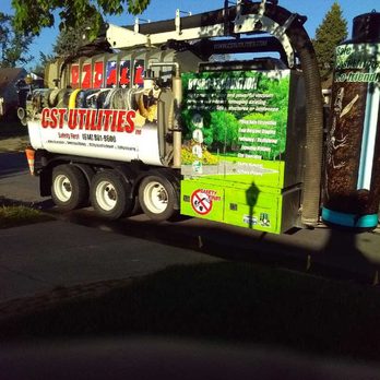 CST Utilities - a garbage truck parked on the side of the road - Hydro-jetting Near Me - Grove City, Ohio