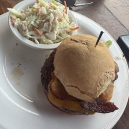 Bacon burger on a GF bun and coleslaw