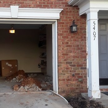 Sunnon Property Management - how the garage floor was left after the leak was stopped - Property Management Near Me - Charlotte, North Carolina Sunnon Property Management - how the garage floor was left after the leak was stopped - Property Management Near Me - Charlotte, North Carolina