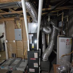 Zach Enterprises - Installation of brand-new complete HVAC system with an upgrade to 96% efficiency.