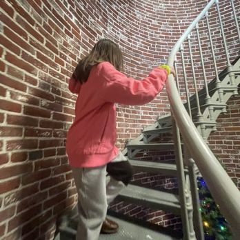 Umpqua River Lighthouse Museum - Up the stairs inside - Museums Near Me - Winchester Bay, Oregon