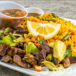 Banaadir Cafe And Grill - Rice with beef steak (suqaar), served over rice