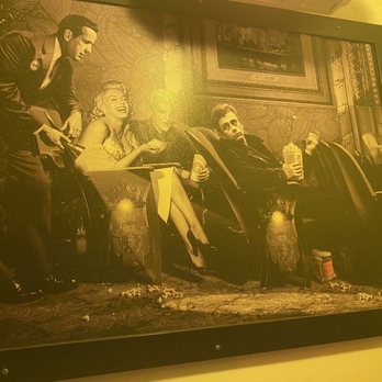 La Cave - Art work in staircase - Steakhouses Near Me - Costa Mesa, California La Cave - Art work in staircase - Steakhouses Near Me - Costa Mesa, California