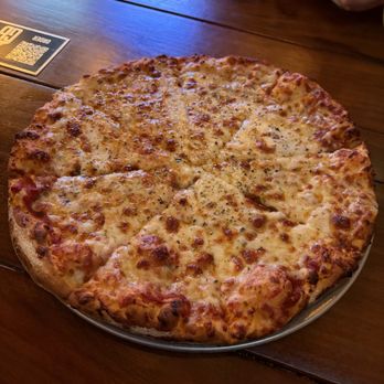 The Growler Bar and Kitchen - Cheese pizza (thin crust) - Beer Bar Near Me - Pflugerville, Texas The Growler Bar and Kitchen - Cheese pizza (thin crust) - Beer Bar Near Me - Pflugerville, Texas