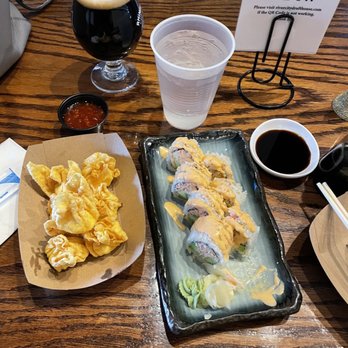 River City Drafthouse - Pictured is the spicy California roll, crab Rangoon and Kentucky Maple Barrel Stout. - New American Near Me - Louisville, Kentucky River City Drafthouse - Pictured is the spicy California roll, crab Rangoon and Kentucky Maple Barrel Stout. - New American Near Me - Louisville, Kentucky
