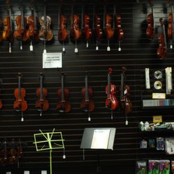 4-Strings Violin Shop - Come see our huge display of violins, cellos, violas, guitars, and ukuleles.