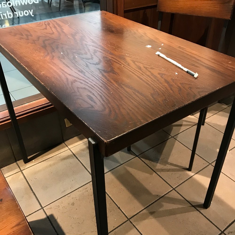 Starbucks - a table with a pen on it - Coffee & Tea Near Me - Melbourne, Florida Starbucks - a table with a pen on it - Coffee & Tea Near Me - Melbourne, Florida