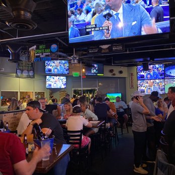Ed's Tavern - a large group of people sitting at tables watching tvs - American Near Me - Lakewood Ranch, Florida Ed's Tavern - a large group of people sitting at tables watching tvs - American Near Me - Lakewood Ranch, Florida
