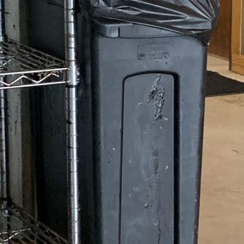 Longhorn Cafe - Something smeared on trash can. - Burgers Near Me - San Antonio, Texas