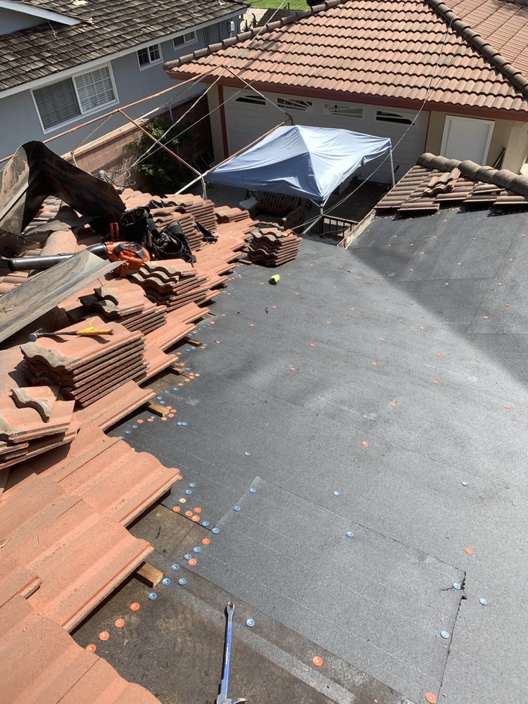 Slide of OC Roofing & Construction