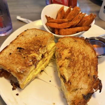 Daily Eats - 2 TWO EGG SANDWICH with sourdough bread, gouda cheese, and bacon with sweet potato fries - New American Near Me - Tampa, Florida