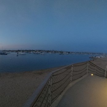 Lighthouse - Sunset from around the corner from restaurant - Breakfast & Brunch Near Me - Newport Beach, California Lighthouse - Sunset from around the corner from restaurant - Breakfast & Brunch Near Me - Newport Beach, California