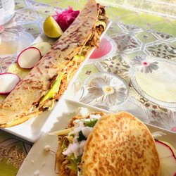 Machetes Doña Leova - Birria Machete (left) & Tinga de Pollo Gordita (right)