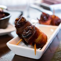 La Cave Wine & Food Hideaway - Bacon-wrapped dates, blue cheese fondue