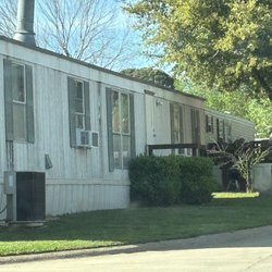 Hickory Creek Mobile Home Community - Ac unit in window