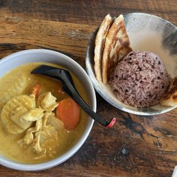 Yellow Curry, purple rice and Roti bread. Yellow Curry, purple rice and Roti bread.