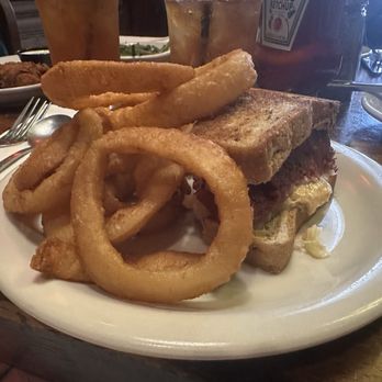 McGurk's - Reuben sandwich with Onion Rings - Pubs Near Me - Saint Louis, Missouri