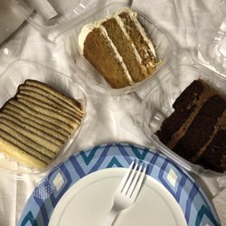 Nancy Jo's Homemade Bakery - Generous Cake Slices $4/ea or 3/$11.00 - (Pictured Left to Right) 12 Layer Chocolate Cake, Carrot Cake, & Chocolate Inside and Out Cake
