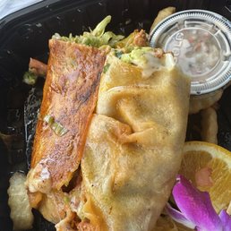Poorly wrapped burrito with hot lettuce Poorly wrapped burrito with hot lettuce