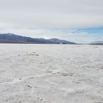 Badwater Basin - Snow capped mountains surrounding the salt water basin. Just amazing - Landmarks & Historical Buildings Near Me - Death Valley, California