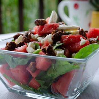 Eggmann's Eatery - Our seasonal Watermelon salad with fresh spinach, feta and candied pecans with our housemade Raspberry Vinaigrette - Breakfast & Brunch Near Me - Centerburg, Ohio Eggmann's Eatery - Our seasonal Watermelon salad with fresh spinach, feta and candied pecans with our housemade Raspberry Vinaigrette - Breakfast & Brunch Near Me - Centerburg, Ohio