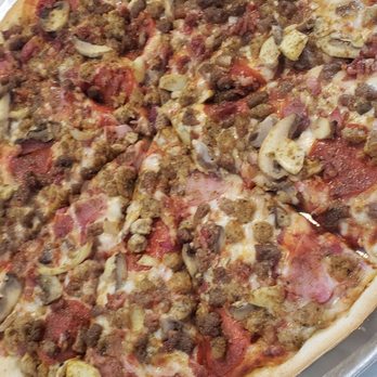 Memphis Pizza Cafe - Hey Meat! All meat pizza - we added mushrooms - Pizza Near Me - Memphis, Tennessee